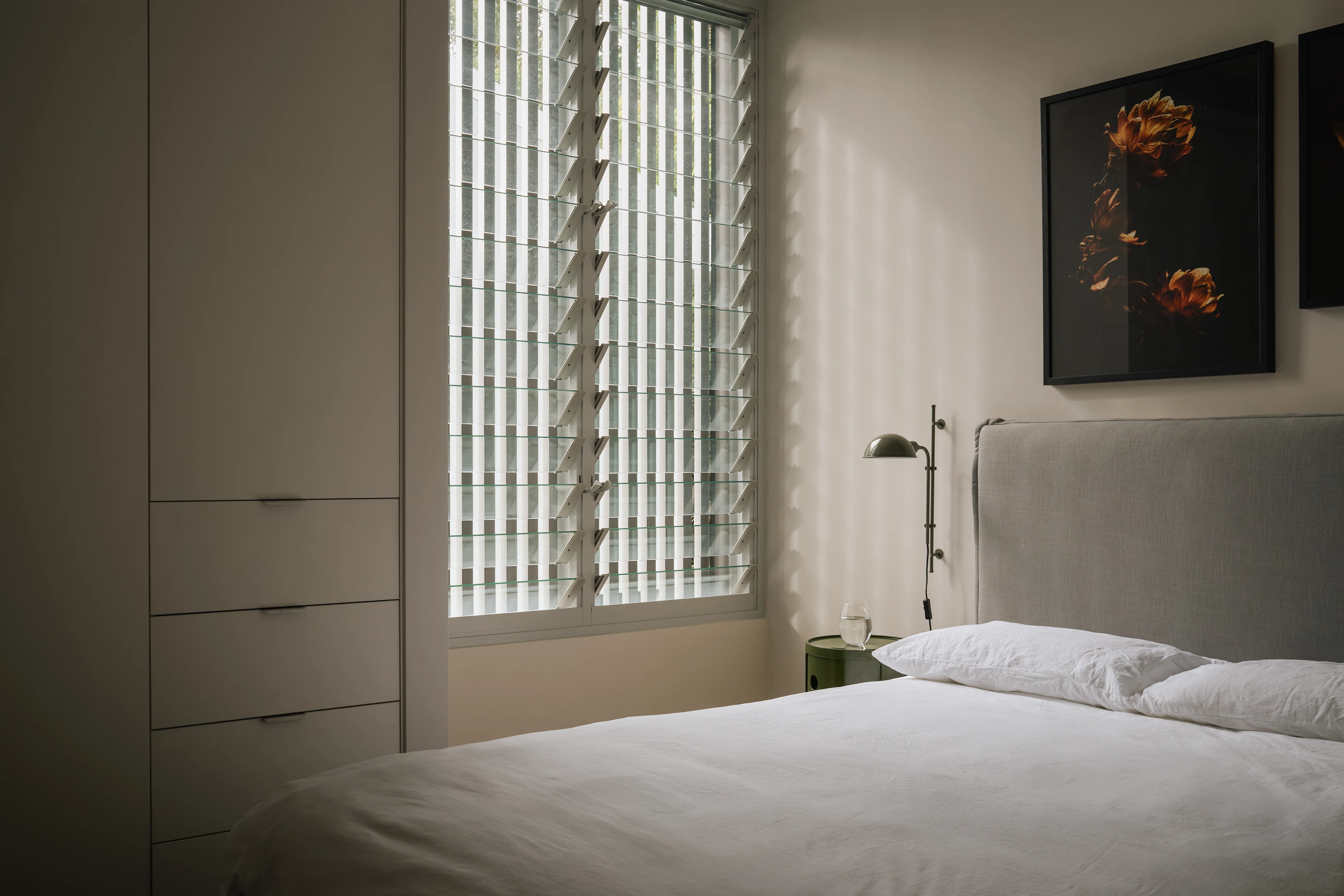 Palmera bedroom with timber shutters and soft daylight