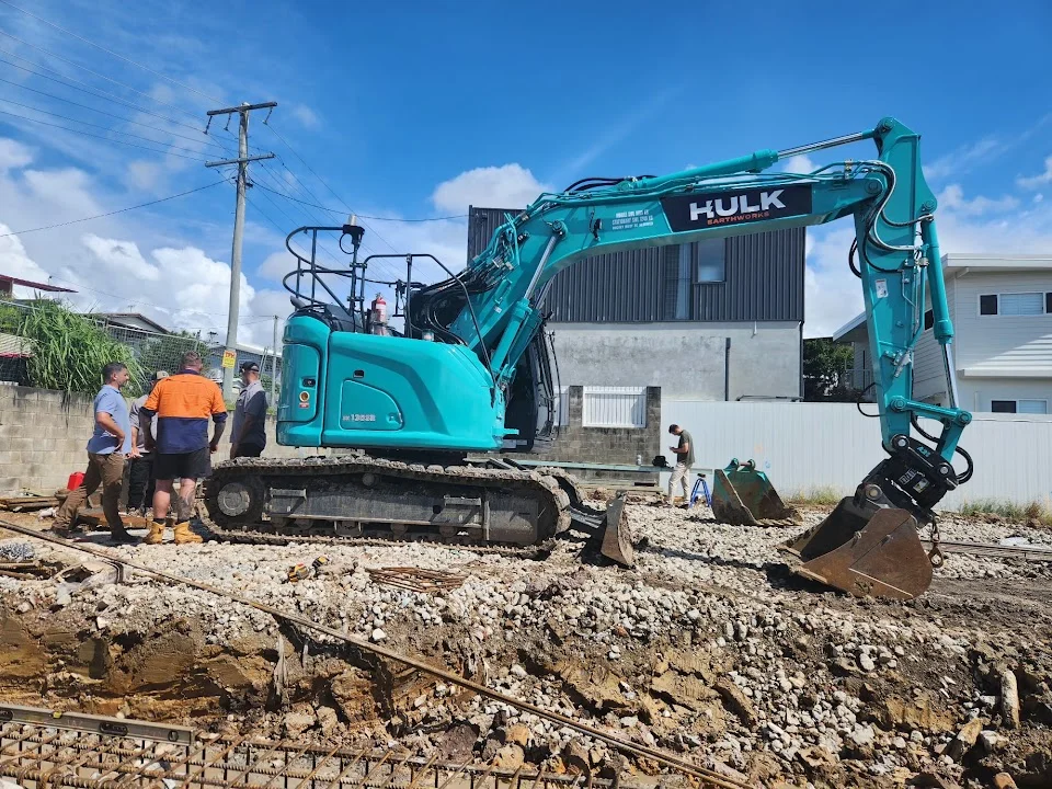 Mayfield House — team and excavator at the soil-turning event