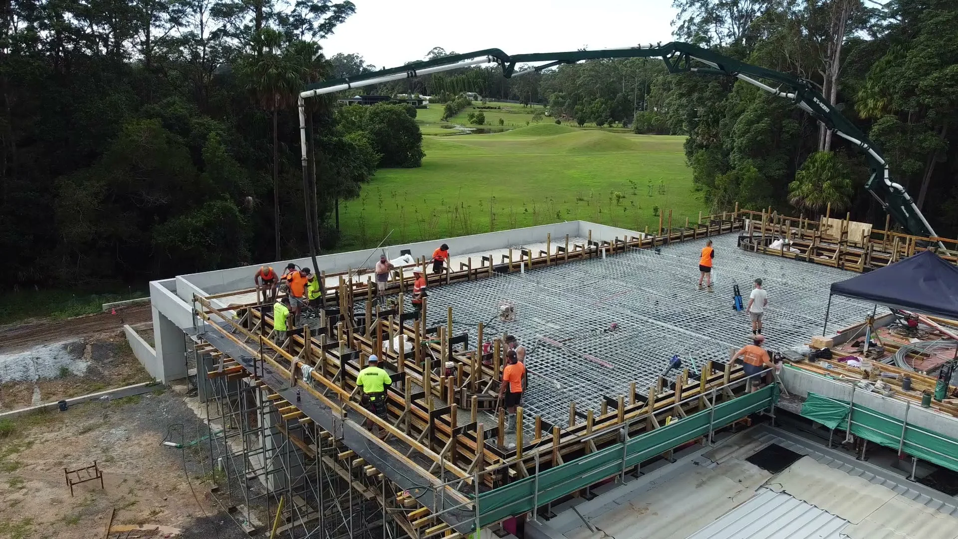 The Villa construction team placing concrete at an earlier stage of the build