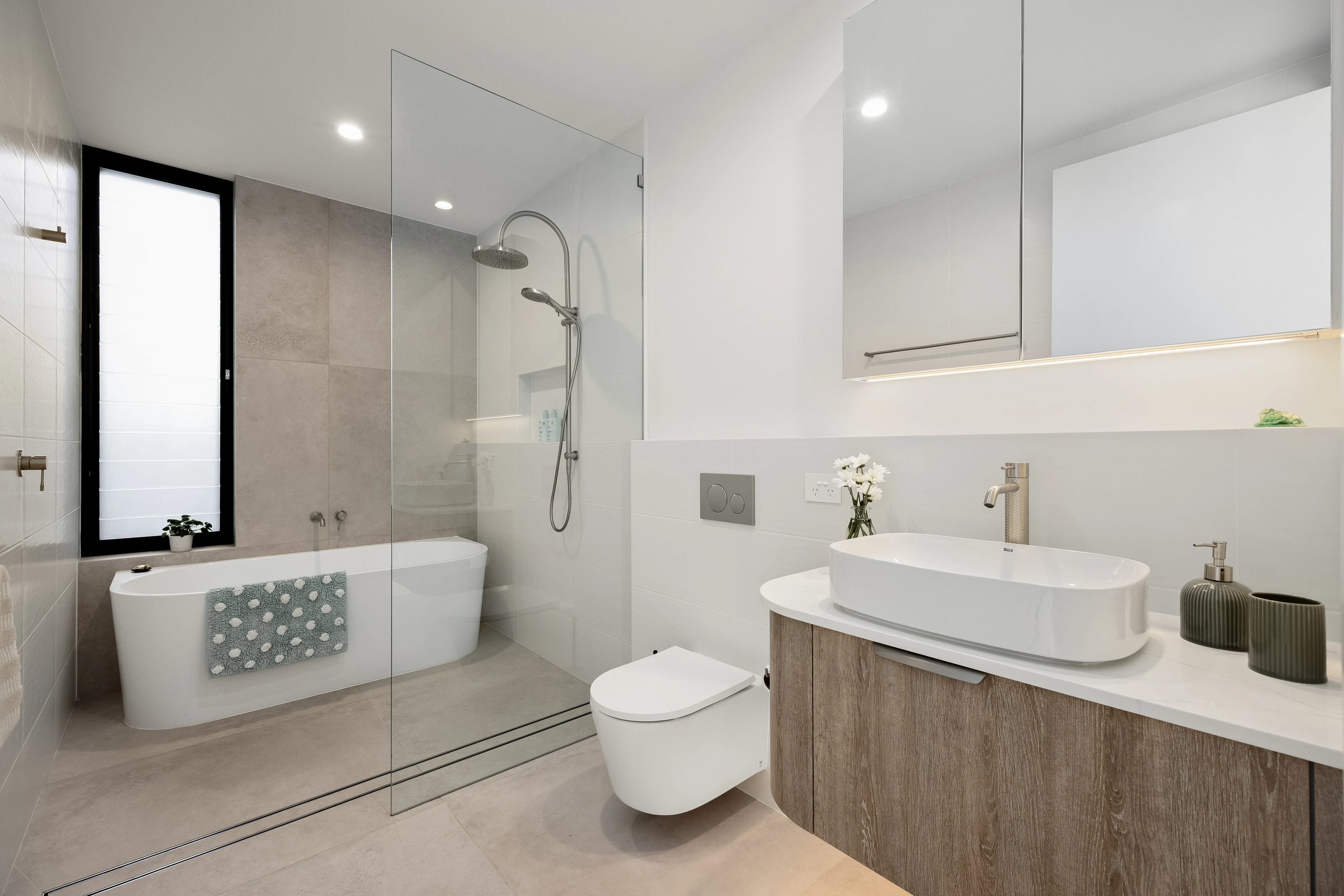 47 Wavecrest bathroom with timber vanity, vessel basin and freestanding bath
