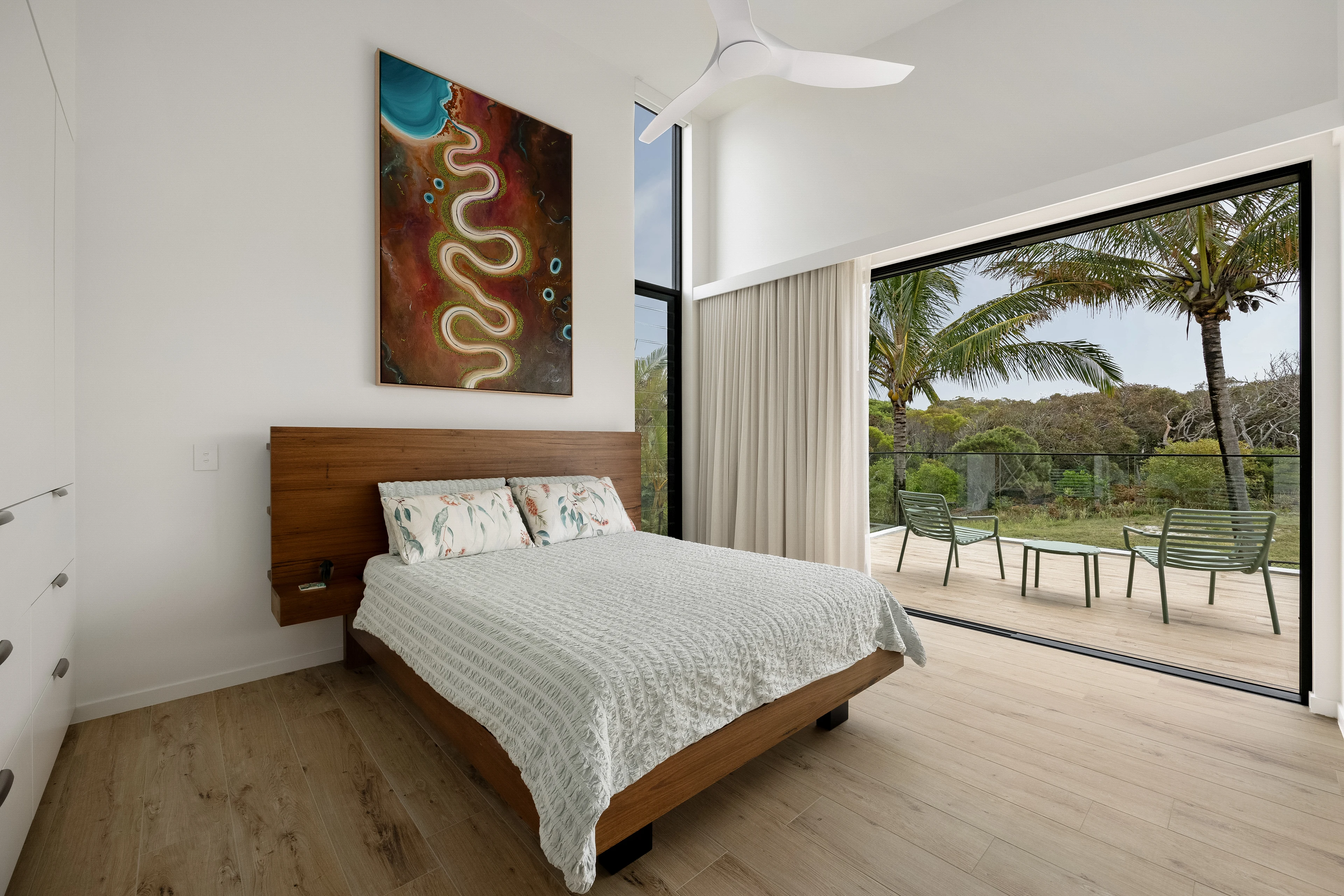 47 Wavecrest bedroom opening onto a planted terrace